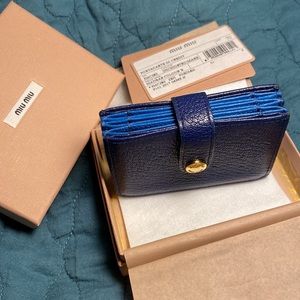 Blue accordion Miu Miu cardholder. *Excellent Condition*